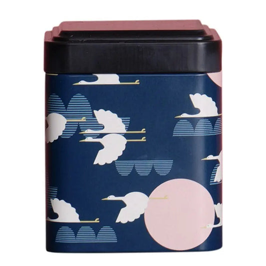 boite-a-the-metal-bleue-et-oiseaux
