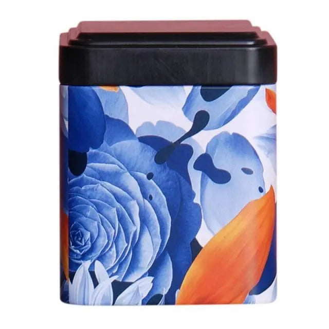 boite-a-the-metal-noir-a-fleurs-bleues