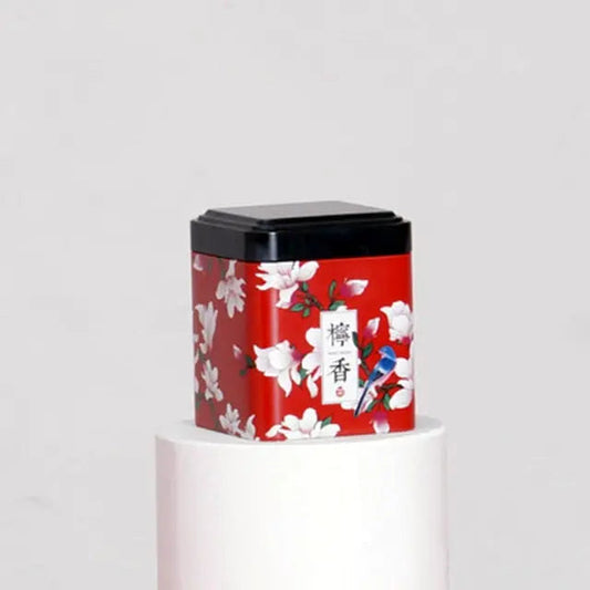 boite-a-the-metal-rouge-et-fleurs-blanches