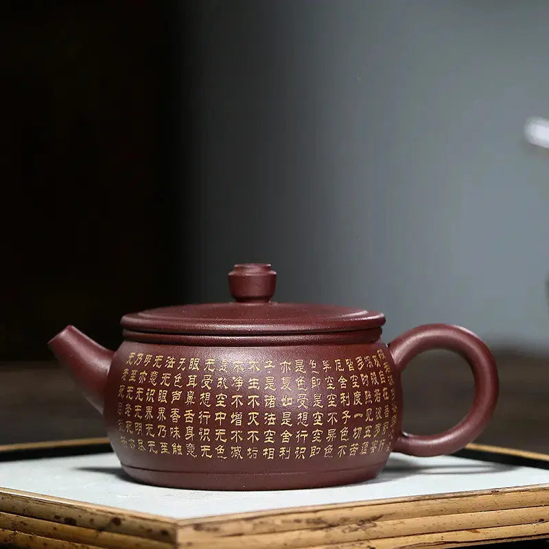 theiere-chinoise-yixing-marron-en-argile-motif-ecritures-260ml
